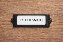 Metal Frame Locker Nametag Holder - With nametag on timber laminate lockers - Secure Lockers.webp